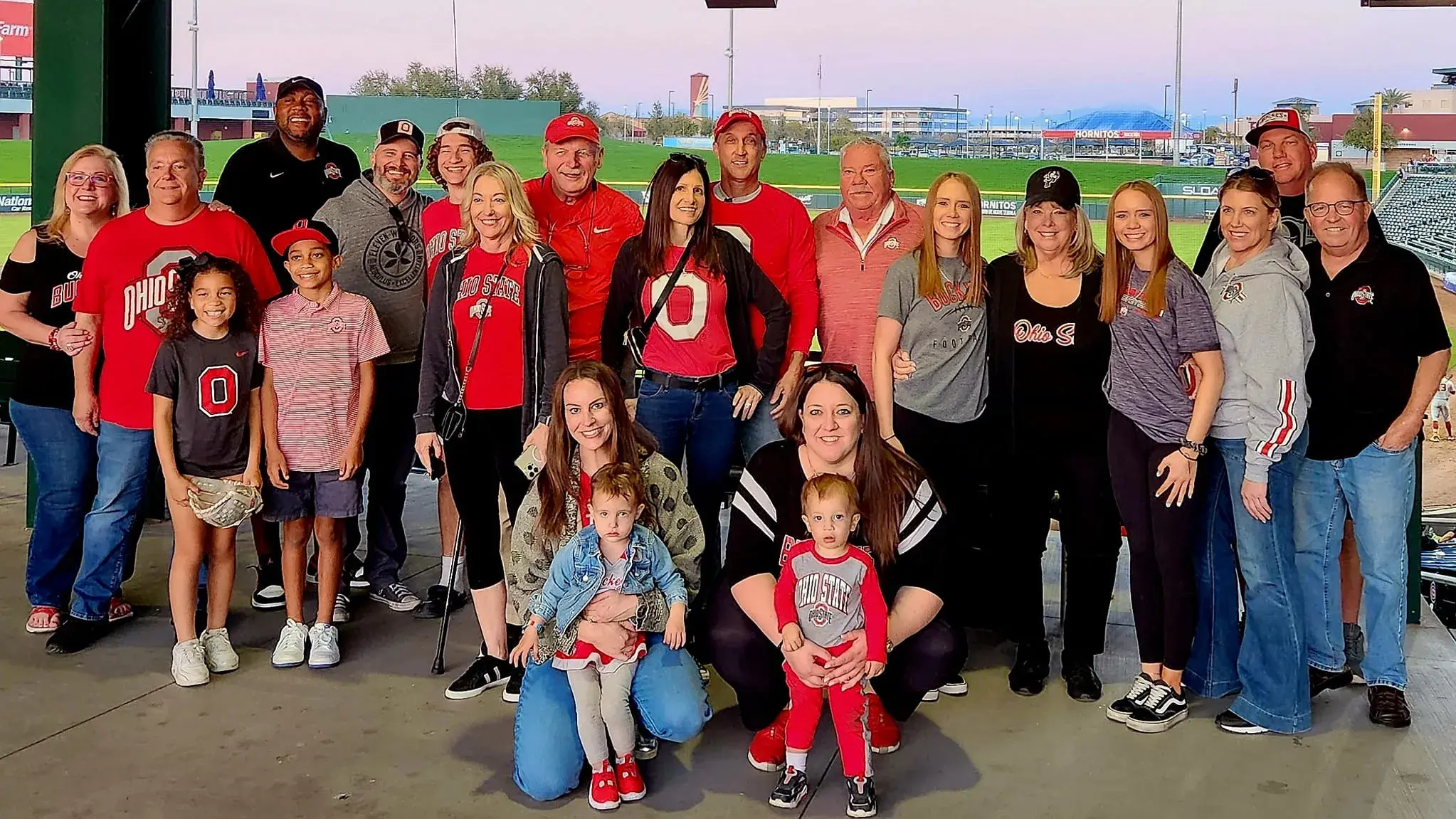 group of twenty phoenix buckeyes wearing scarlet and gray apparel