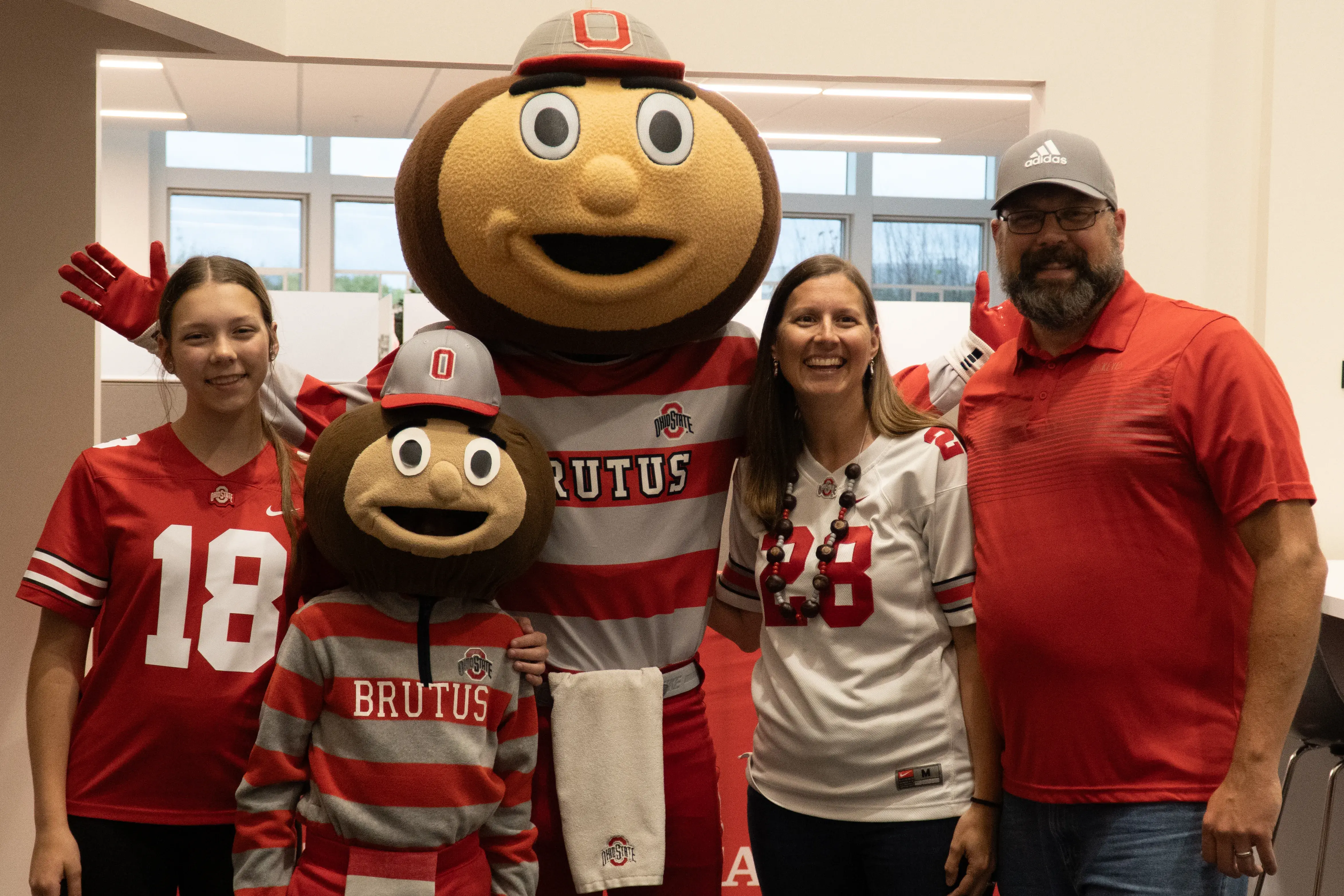 A family of Buckeye fans with Brutus Buckeye