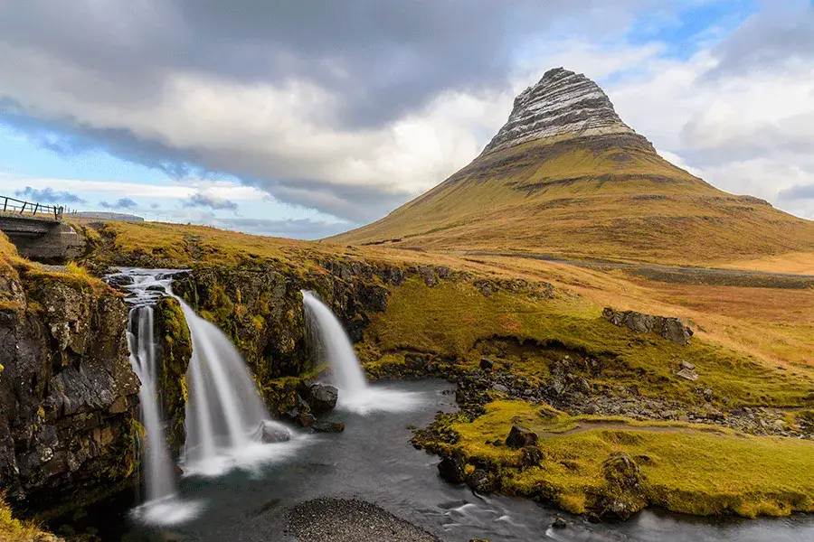 A large peak overlooking waterfalls