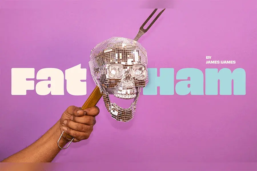 A person's arm and hand holding a large grilling meat fork skewering a disco ball in the shape of a human skull with text reading Fat Ham