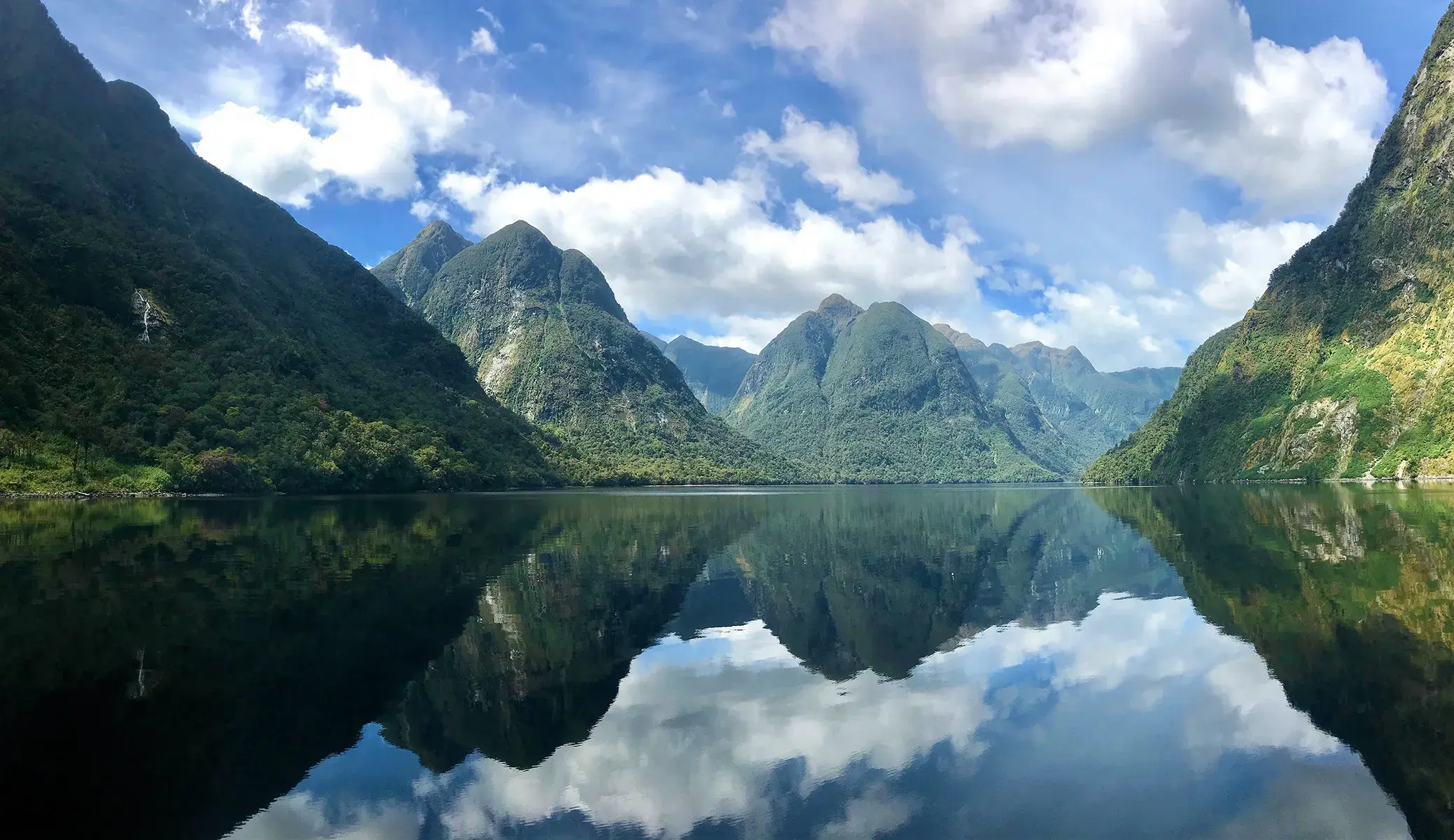 Hills surrounding a narrow body of water