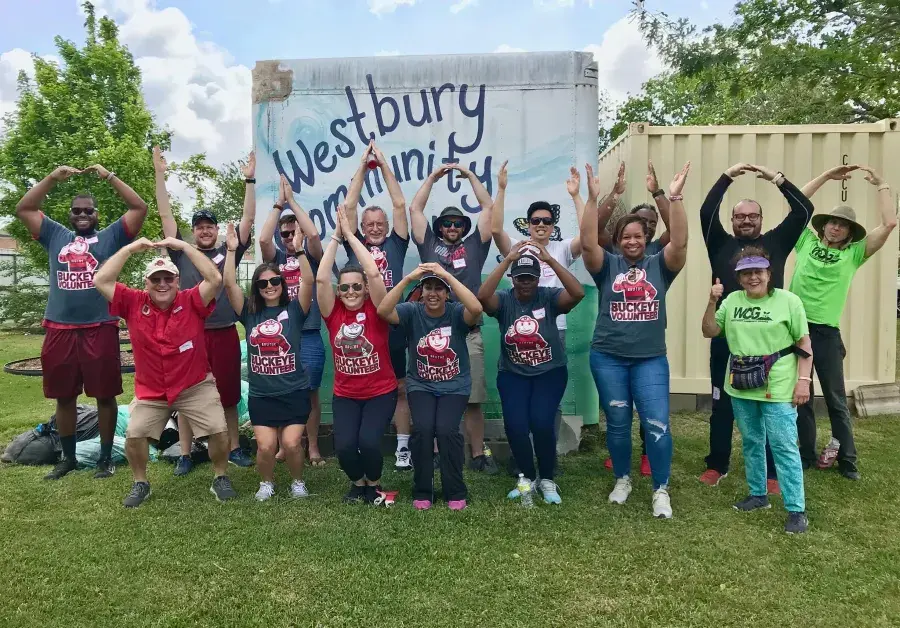 Ohio State Alumni volunteering at Westbury Community Garden