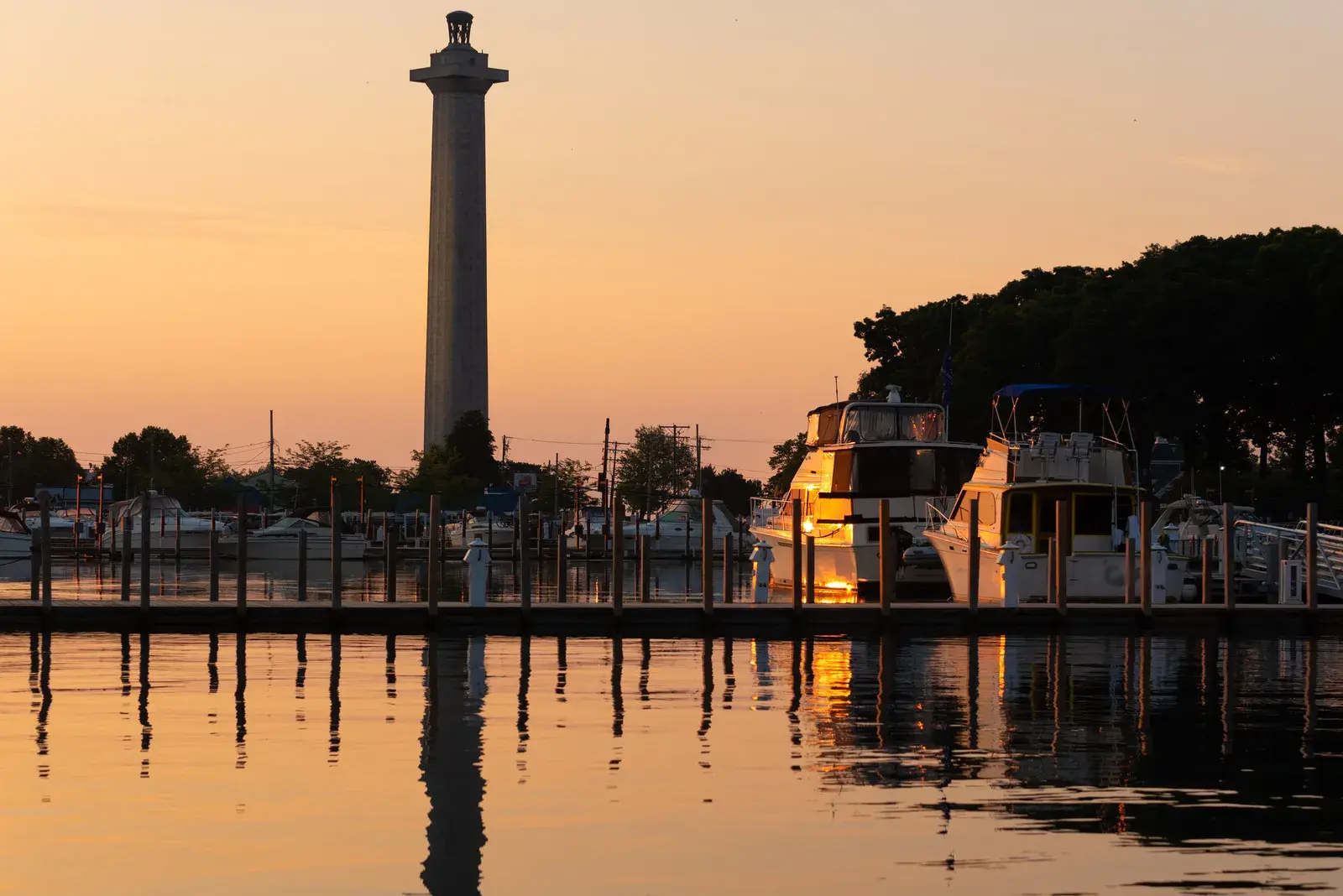 boats on dock at sunrise