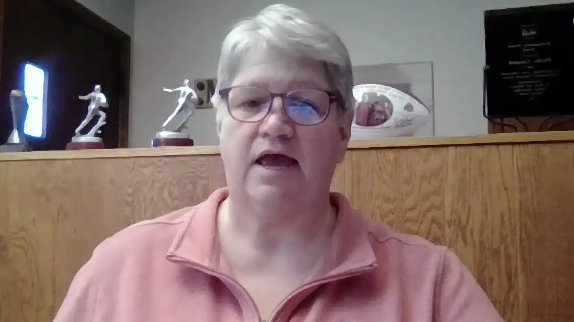 woman wearing glasses and an ohio state sweatshirt