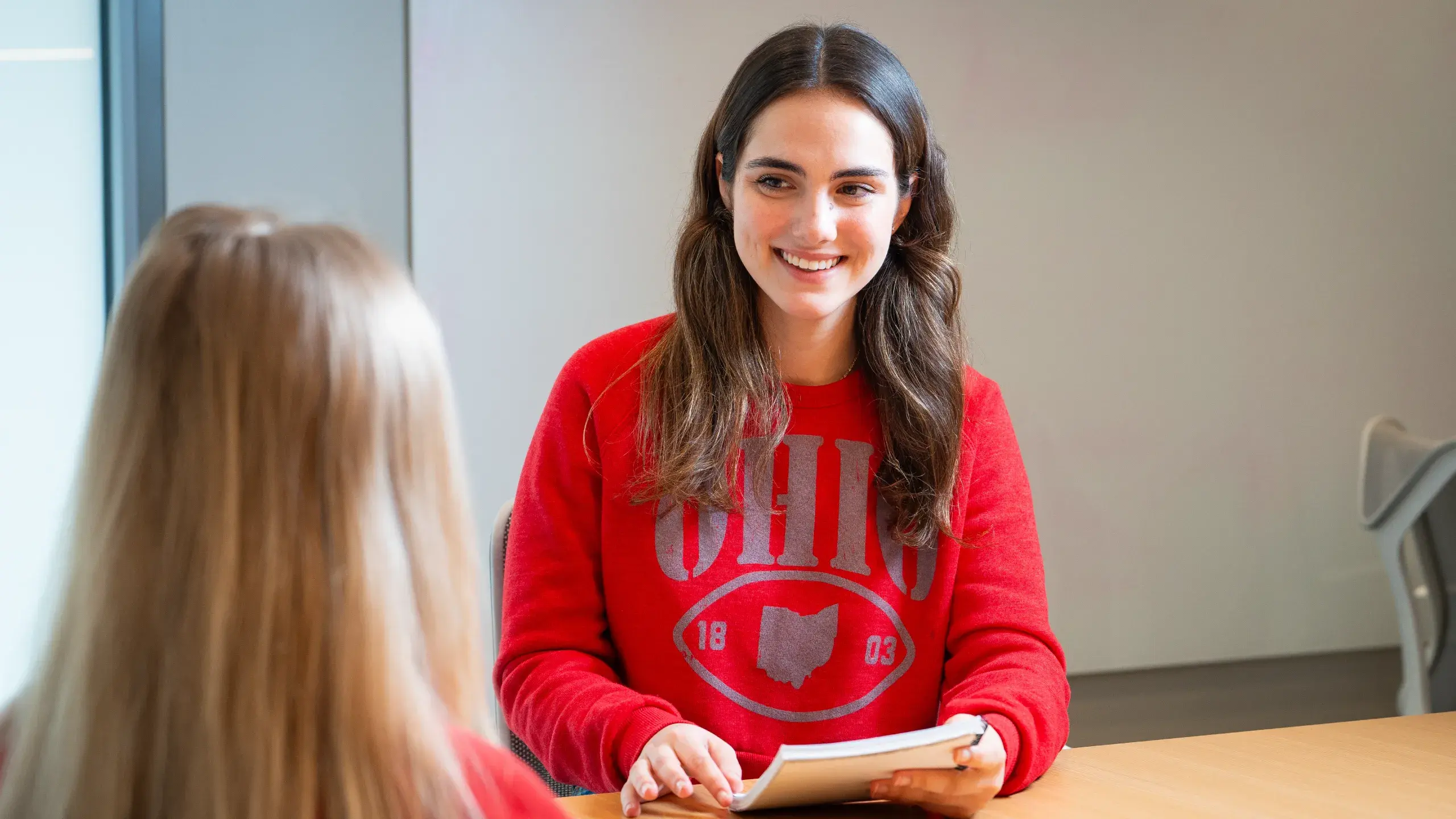 Two young people having a meeting