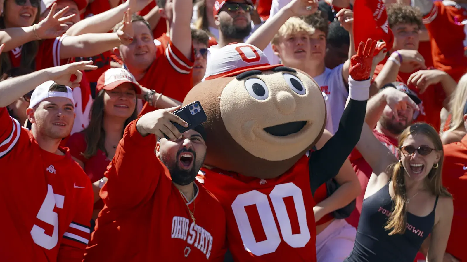 buckeye fans cheering inside Ohio Stadium