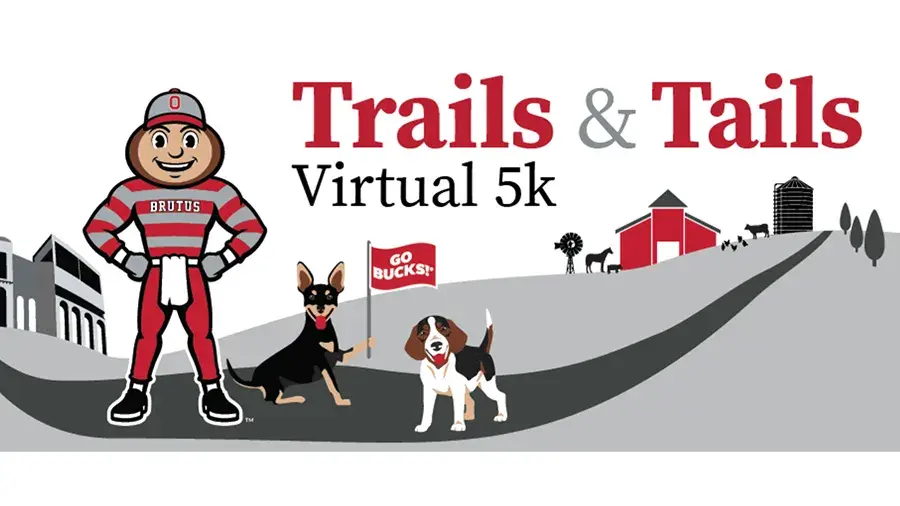 Illustration for the ‘Trails &amp; Tails Virtual 5k’ showing the Ohio State Brutus Buckeye mascot standing with two dogs on a winding road, with a barn, silo, windmill, and rural landscape in the background.