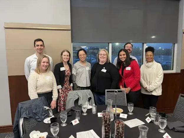 Group of students posing for an event with Women in STEM Alumni Society.
