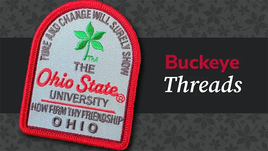 Buckeye Threads graphic featuring an embroidered Ohio State patch beside the text “Buckeye Threads” on a dark patterned background.