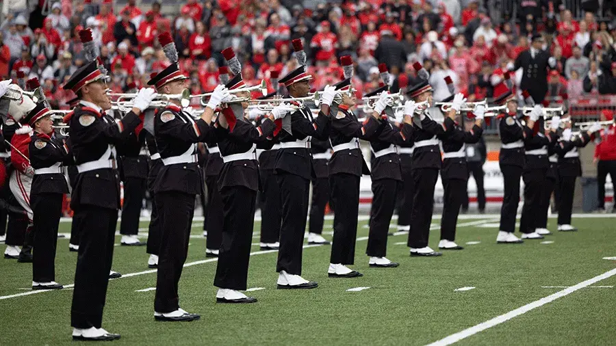 The Ohio State University Marching Band performing on the field at Ohio Stadium
