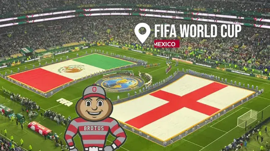 Soccer stadium with large Mexico and England flags on the field, a “FIFA World Cup Mexico” graphic, and a Brutus Buckeye mascot in the foreground.