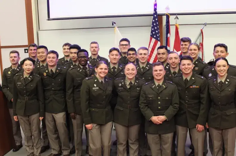 Group of army rotc members at event.