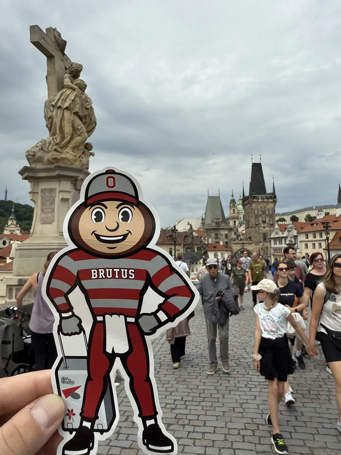 Brutus in a crowd in Old Town Square in Prague, Czech Republic.