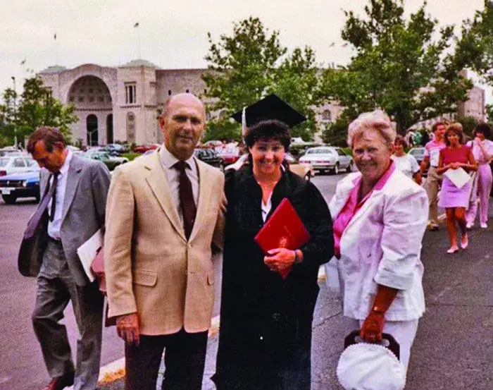 Alumni Association President/CEO Molly Ranz Calhoun ’86 with her parents on her graduation day