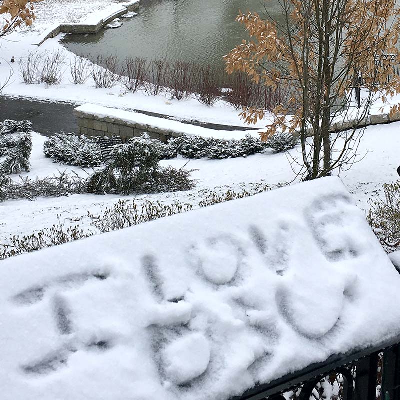 A photo featuring I love you written in the snow.