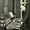 Allen McManigal uses original wooden levers to play the chimes.