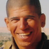 Raised in Queens, New York, Ray Mendoza entered the Marine Corps in 1995.