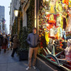 Mark Gagnon poses in front of the window displays he created for Bergdorf Goodman department store in New York City.