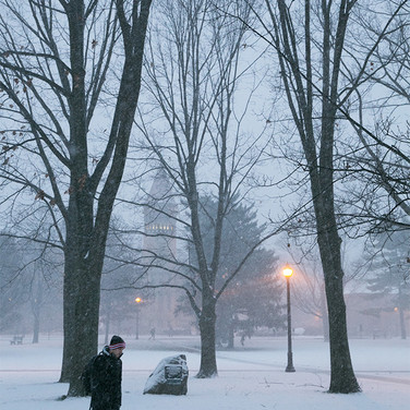 Students walk through winter's cold on their way to class at the start of spring semester in January 2016.