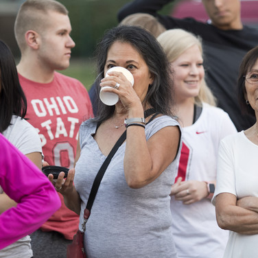 Plenty of coffee is available for early risers such as Melinda Swan, who left her Hinckley, Ohio home at 4:30 for the two-hour drive to drop off freshman daughter Ruby, left. “I’m really impressed with the organization of this move-in,” Melinda says. “It’s very welcoming.”