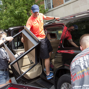 Three hands are better than one as Keith Johnson of Nelsonville, Ohio moves his son, sophomore Ben Johnson, into Smith-Steeb Hall.