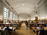 Library reading room filled with students