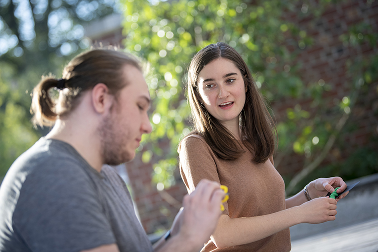 Ohio State student Caroline Karbowski works with a fellow student