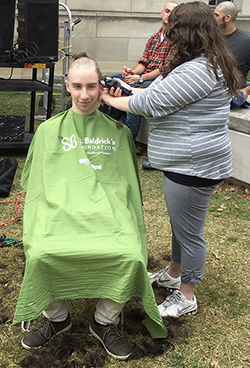 Ben Hood getting his head shaved for St Baldrick's