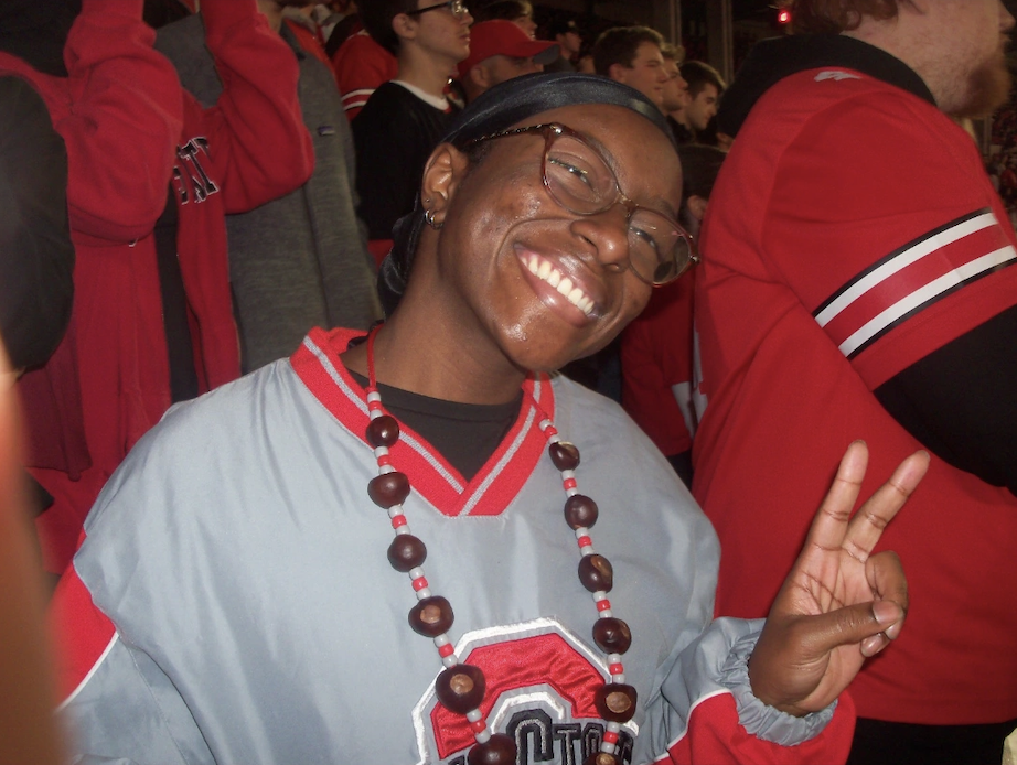 Cerena Dawson in Buckeye attire standing in a crowd.