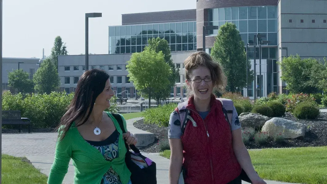 two students walking in front of a building on osu's marion campus