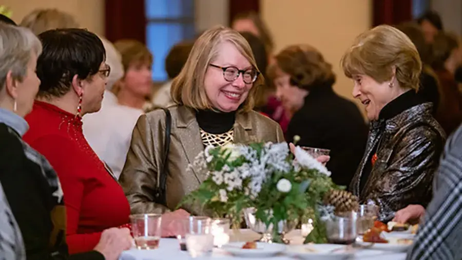 Four women sitting at a table