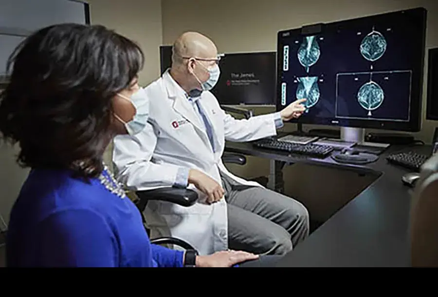 Doctor going over a brain scan with a patient