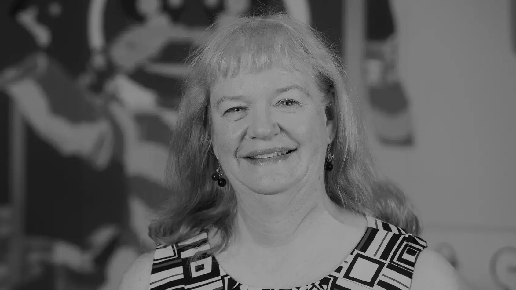 black and white portrait of Karla Zadnik, OD, PhD wearing a geometric pattern dress