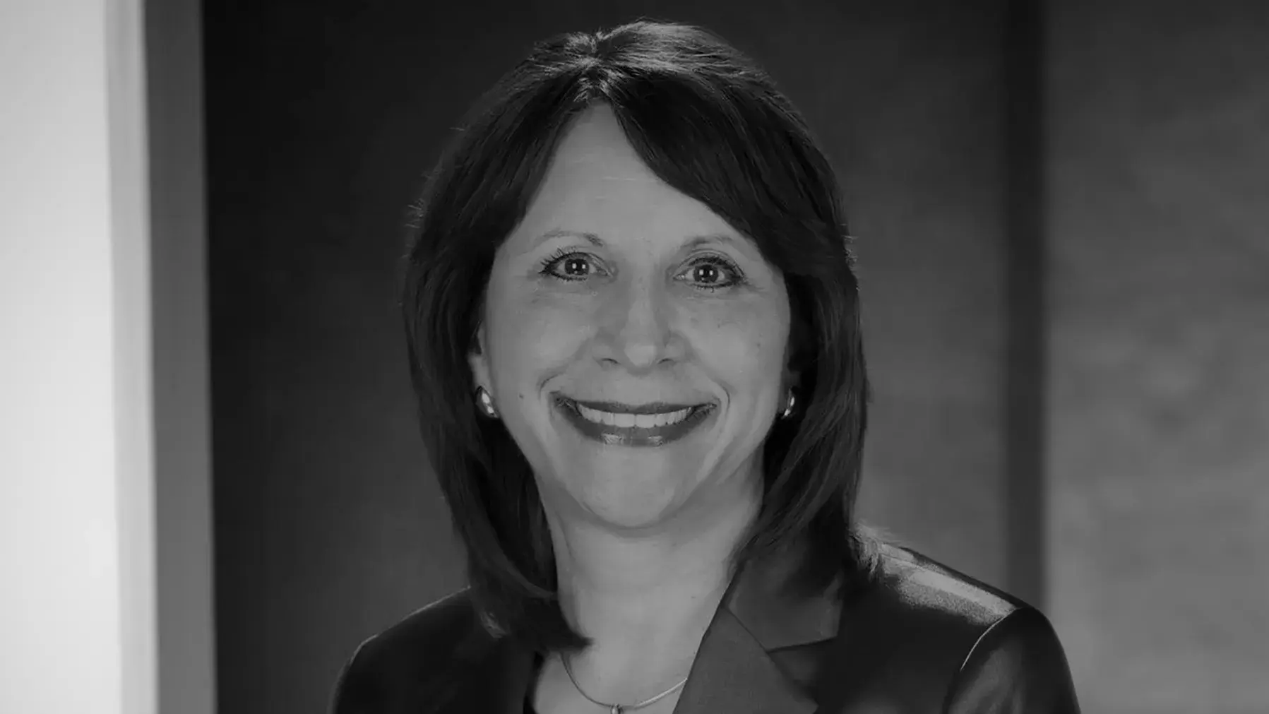 black and white portrait of Bernadette Melnyk, PhD smiling