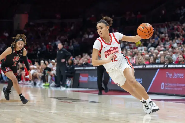 Celeste Taylor dribbles down the court at an Ohio State women's basketball game