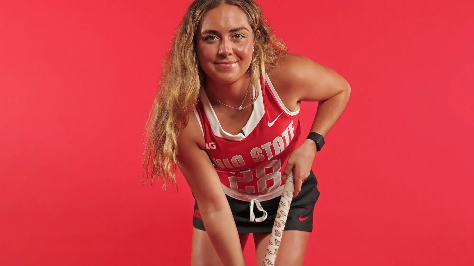 Makenna Webster poses with her field hockey gear