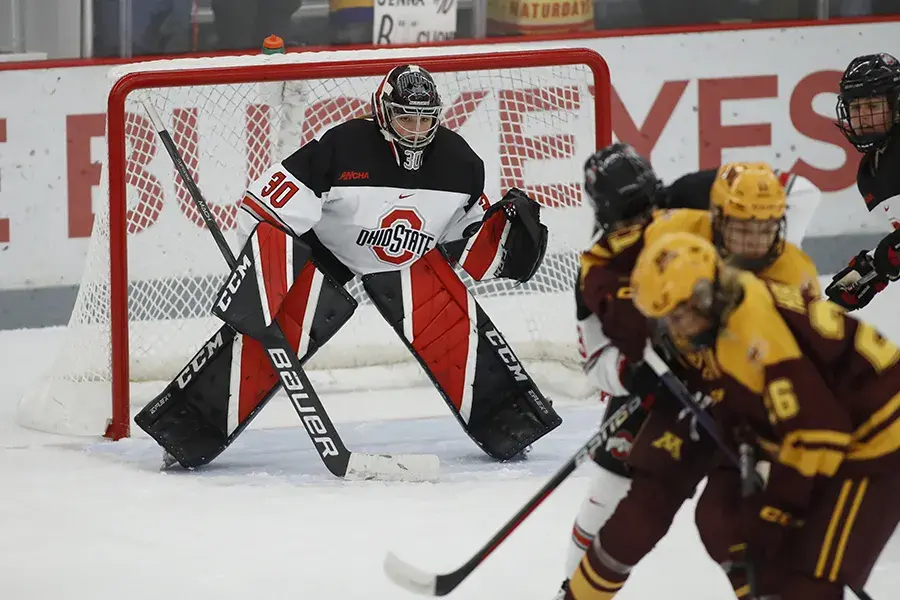 Ohio State women's hockey goalie protects the goal