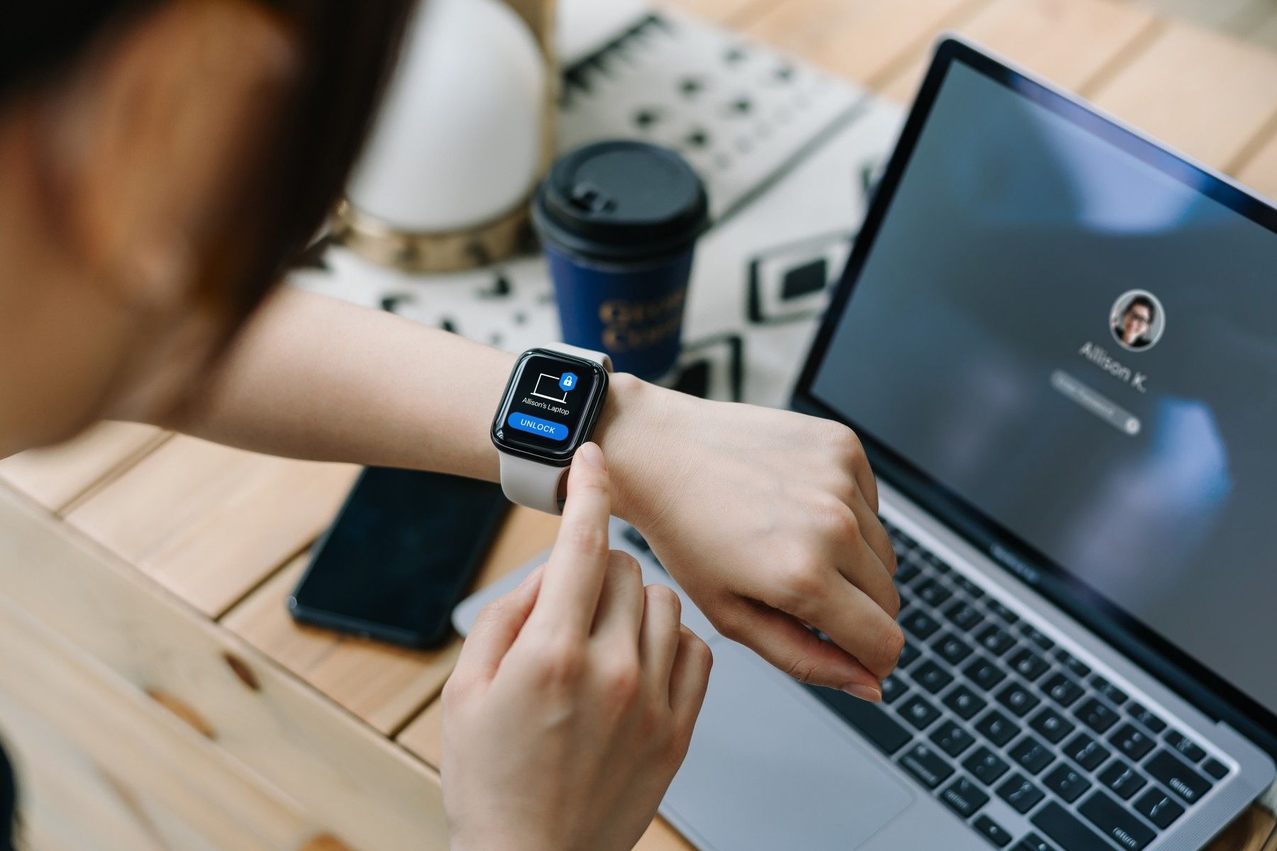 A person interacts with a Bluetooth-enabled smartwatch