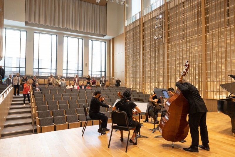 Musicians on stage at the Timashev Family Music building.