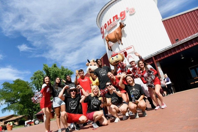Ohio State students pose with mascots.