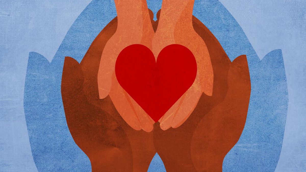 An illustration of a heart inside hands