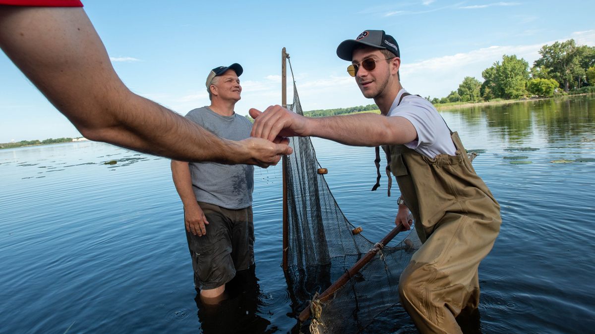 Harrison Fried, right, in Lake Erie