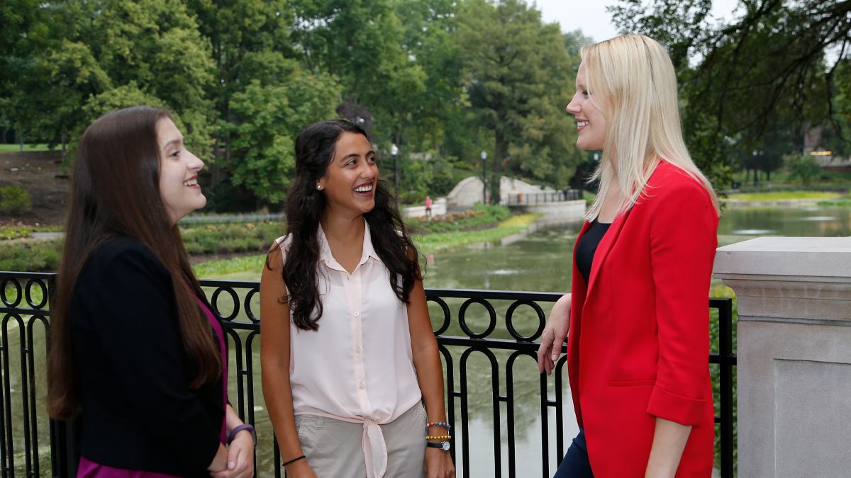 Ohio State sociology faculty member Hollie Nyseth Brehm (right) speaks with students Genna Danial (left) and Deborah Makari.