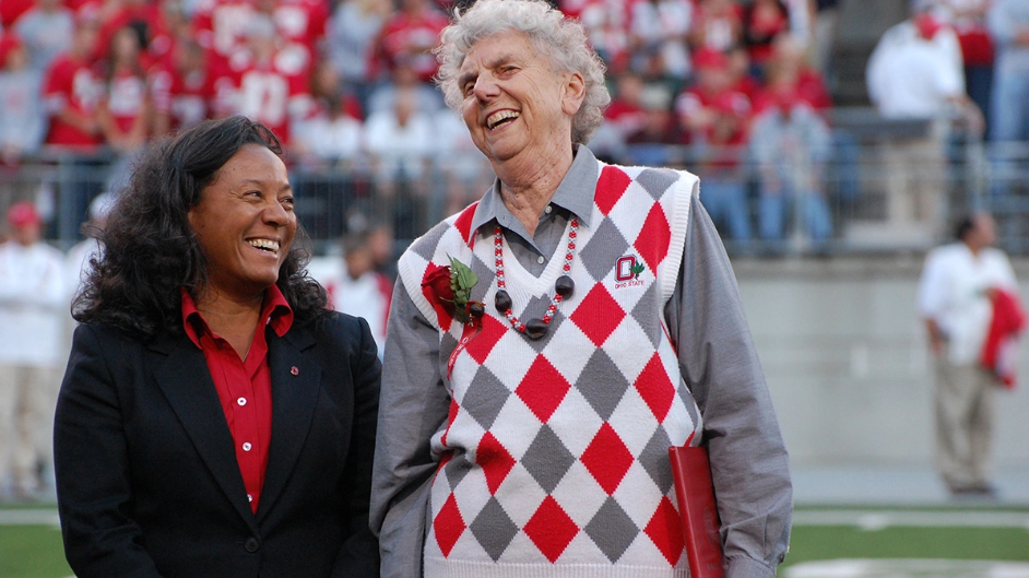 Associate Athletic Director Miechelle Willis, left, and Phyllis Bailey laugh during the presentation of Bailey’s career achievement award in 2007.
