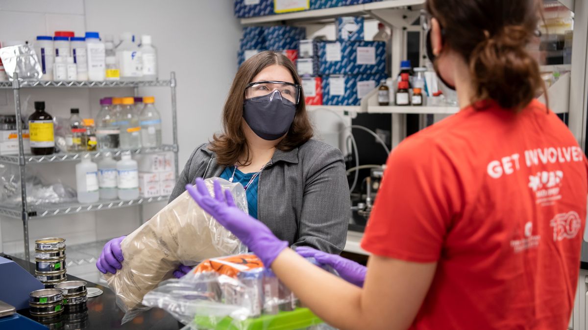 Karen Dannemiller and a student in the lab