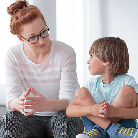 image of a mom sitting with her son